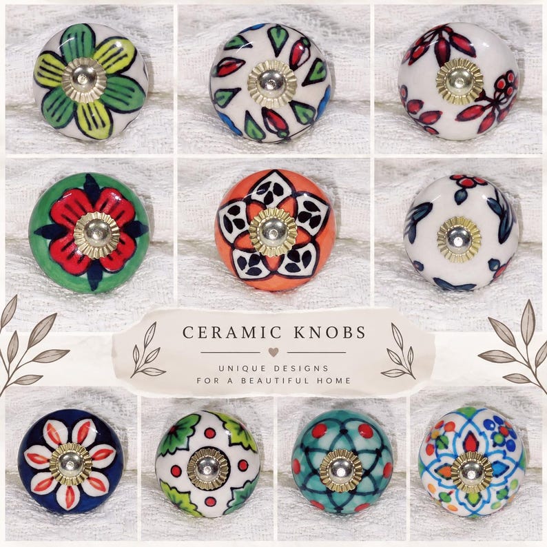 May include: A collection of ten round ceramic knobs featuring various hand-painted floral and geometric patterns in colors including red, green, blue, and orange. Each knob has a central metallic silver-tone hardware piece for mounting.