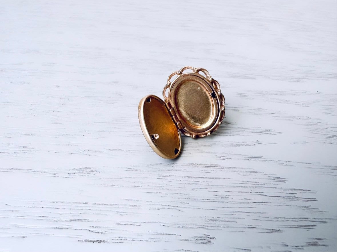 Avon locket deals ring