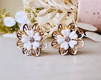 Gold Filigree Flower Earrings, 1960s Vintage Earrings, White and Gold Bridal Clip On Earrings, White Acrylic Petals with Rhinestone Centers