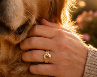 Ring met gepersonaliseerde pootafdruk als aandenken, een uniek sieraad.