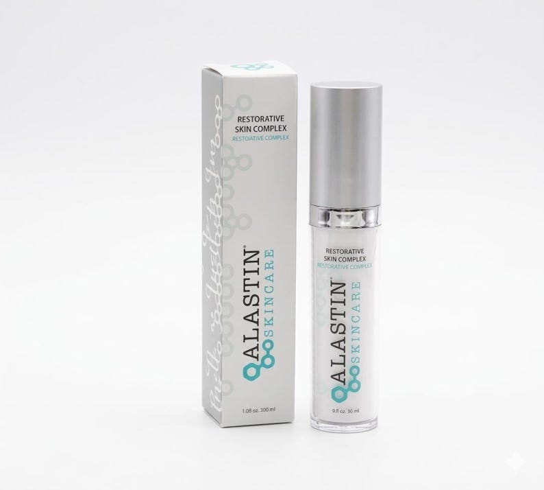 May include: A cylindrical skincare pump bottle and its matching rectangular box, both in white and silver with teal accents. The packaging features the text ALASTIN SKINCARE and RESTORATIVE SKIN COMPLEX, with a volume of 1.0 fl oz or 30 ml.