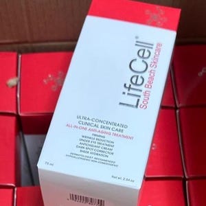 May include: A rectangular LifeCell South Beach Skincare box with a white front and red top. The text reads Ultra-Concentrated Clinical Skin Care, All-In-One Anti-Aging Treatment, Firming, Wrinkle Reduction, Under Eye Treatment, and Net wt. 2.54 oz.