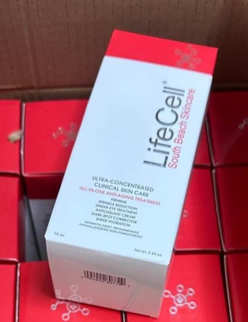 May include: A rectangular LifeCell South Beach Skincare box with a white front and red top. The text reads Ultra-Concentrated Clinical Skin Care, All-In-One Anti-Aging Treatment, Firming, Wrinkle Reduction, Under Eye Treatment, and Net wt. 2.54 oz.