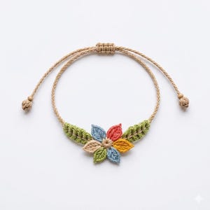 May include: A macrame bracelet featuring a central flower motif made of six crocheted leaf-shaped petals in blue, red, yellow, and green. The band is made of tan cord with a sliding knot closure and two small wooden beads at the ends of the cords.