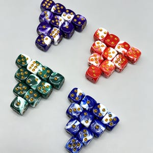 May include: Four triangular arrangements of six-sided dice, each set featuring a distinct color swirl pattern including purple, red, green, and blue. Each die has rounded corners and gold-colored pips indicating the numerical values.