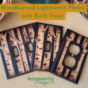 May include: Three woodburned light switch plates with a birch tree design. The plates are dark brown with light brown birch trees. The text "Woodburned Lightswitch Plates with Birch Trees" is at the top of the image.
