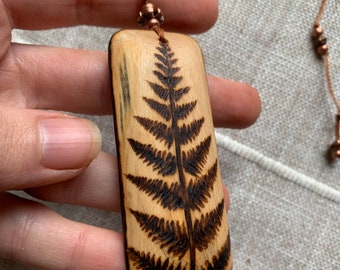 Adjustable Wood Pendant Necklace on a Beaded Cord with Pyrography Designs burned by hand