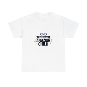 May include: A white short-sleeve t-shirt featuring a graphic print with a rainbow-colored infinity symbol above the text Raising an AMAZING CHILD in dark blue letters, accented by small colorful stars on the left and right sides.