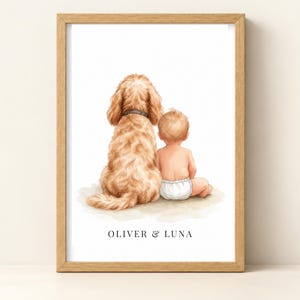 May include: A framed watercolour illustration of a golden-coloured dog sitting next to a baby wearing a white nappy. Both are viewed from behind, facing away from the viewer. The text OLIVER & LUNA is printed in black at the bottom of the print.