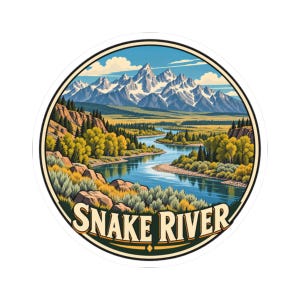 May include: A circular sticker featuring a landscape illustration of the Snake River winding through a valley with snow-capped mountains in the background, green trees, and rocky terrain. The text SNAKE RIVER is printed in a bold font at the bottom.