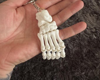Brelok z ruchomą stopą szkieletu – elastyczna zabawka Fidget Toy, drukowana w 3D