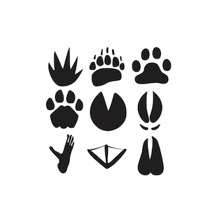 May include: A collection of nine black animal track silhouettes arranged in a three-by-three grid. The icons include various paw prints, hoof prints, and bird tracks, each rendered as a solid black shape against a plain white background.