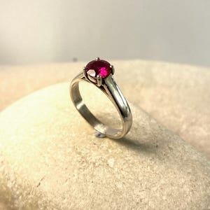 Classic silver solitaire ring with synthetic ruby