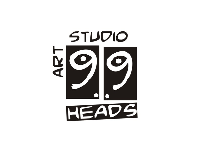 May include: Black and white logo with the text "STUDIO ART 99 HEADS". The number "99" is in a stylized font, within two black squares. The word "ART" is vertically aligned on the left.
