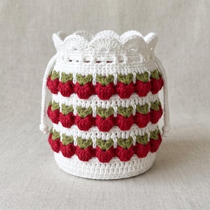 Patrón de bolsita de ganchillo con diseño de fresa, bolsita con textura de punto palomita (descarga en PDF)