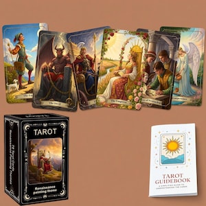 Könnte beinhalten: Ein Tarotkartenset bestehend aus einer schwarzen Schachtel mit der Aufschrift TAROT Renaissance Painting Themes, einem weißen Begleitbuch und sechs einzelnen Karten, die Der Narr, Der Teufel, Der Wagen, Die Herrscherin, Drei der Münzen und Mäßigkeit zeigen.