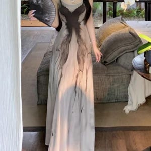 Art Print Dress | Waist Detail Long Gown | Party Wear | Soft Summer Style

Art print dress with waist detail, long gown shape, sleeveless cut, and soft summer party styling.
