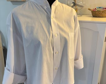 One-of-a-kind upcycled blouse handcrafted redesigned into a trendy cropped silhouette with a feminine ruffled collar