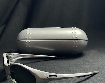 Oakley Eye Jacket Redux-zonnebril: zilveren montuur, Prizm zwarte gepolariseerde lenzen, hoge brugpasvorm