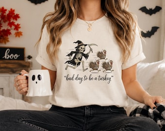 Camiseta divertida de Acción de Gracias y Halloween "Un mal día para ser un pavo" PNG