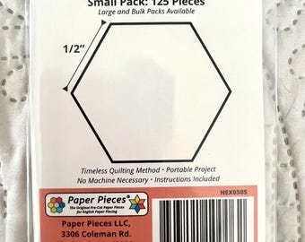 Trozos de papel hexagonales de 1/4”