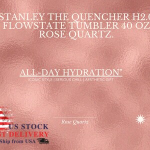 May include: A rose quartz colored Stanley The Quencher H2.0 Flowstate Tumbler 40 oz. The text reads: STANLEY THE QUENCHER H2.0 FLOWSTATE TUMBLER 40 OZ ROSE QUARTZ. ALL-DAY HYDRATION. ICONIC STYLE | SERIOUS CHILL | AESTHETIC GIFT. Rose Quartz.