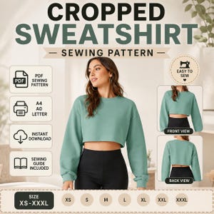 Könnte beinhalten: Ein digitales Schnittmuster für ein bauchfreies Sweatshirt in Salbeigrün. Die Grafik zeigt den Text CROPPED SWEATSHIRT SEWING PATTERN, PDF, A4, A0, LETTER, INSTANT DOWNLOAD, SEWING GUIDE INCLUDED, EASY TO SEW sowie die Größen XS-XXXL mit Vorder- und Rückansicht.