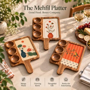 May include: Three rectangular wooden serving platters with handles, each featuring three integrated circular bowls and a decorative ceramic inlay. The designs include floral motifs, a bird, and geometric patterns. Text reads The Mehfil Platter.
