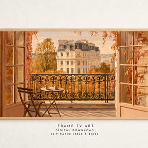 May include: A digital artwork print for a television screen depicting a balcony view with a small round table, two chairs, and a wrought iron railing. The scene shows autumn foliage, open French doors, and a multi-story building in the background.