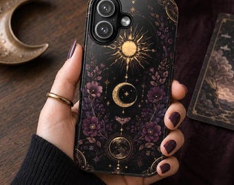 May include: A black smartphone case featuring a gold sun, a crescent moon, and a full moon graphic. The design includes purple floral accents, small stars, and thin gold lines on a dark background, with a dual camera cutout at the top.