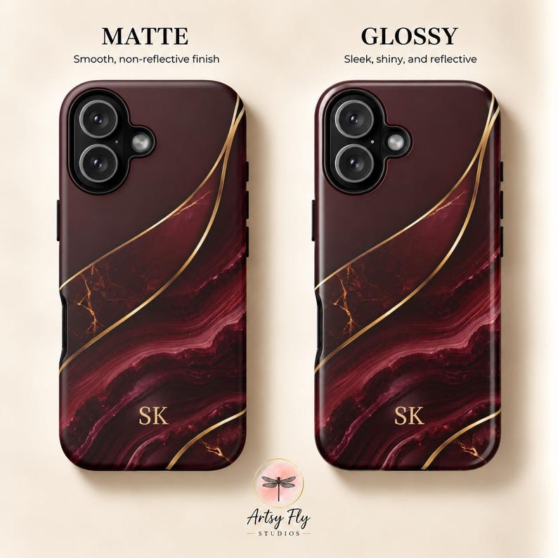 May include: Two phone cases featuring a deep burgundy and black marble pattern with gold vein accents and the initials SK in gold. One case has a matte finish, while the other has a glossy finish. Text labels indicate MATTE and GLOSSY.