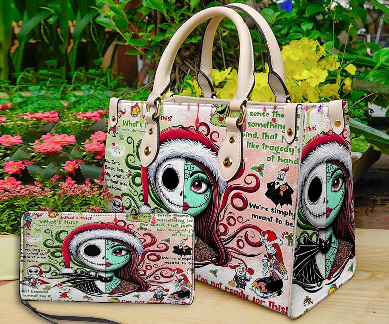 May include: A structured handbag and a matching rectangular wallet featuring a split-face character graphic of Jack Skellington and Sally wearing Santa hats. The design includes red, green, and white patterns with text excerpts from The Nightmare Before Christmas.