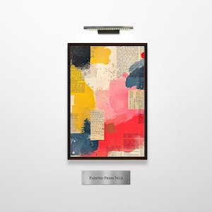May include: A rectangular framed wall art piece featuring a collage of newspaper clippings layered with abstract paint splashes in vibrant yellow, deep blue, and bright red. Below the frame, a silver plaque displays the text PAINTED PRESS NO.9.