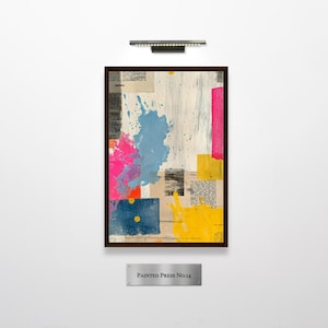 May include: A rectangular framed wall art piece titled Painted Press No.14, featuring a collage of printed text fragments layered with abstract paint splatters in vibrant blue, hot pink, bright yellow, and orange against a neutral background.