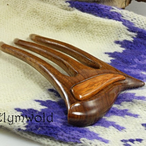 A  3  prong Tasmanian blackwood and silky oak hair fork.  Handmade by Elymwold.