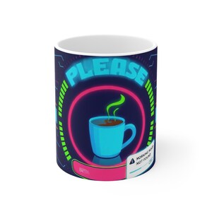 May include: A white ceramic mug featuring a dark blue background with a neon-style graphic. The design includes the word PLEASE in light blue, a central light blue coffee cup with green steam, and a small box labelled MORNING MOOD NOT FOUND.