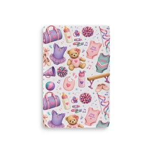 May include: A rectangular fabric print featuring a repeating pattern of baby and dance-themed items including teddy bears, purple leotards with tutus, pink cheer uniforms, gym balance beams, pom-poms, baby bottles, pacifiers, and duffel bags.