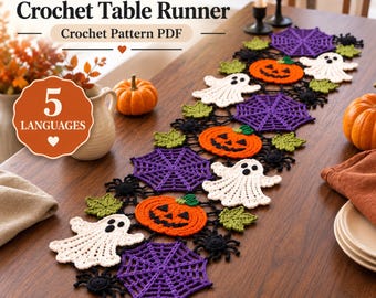 May include: A Halloween crochet table runner pattern PDF featuring repeating motifs of orange jack-o'-lanterns, white ghosts, purple spider webs, green leaves, and black spiders. The text reads Halloween Crochet Table Runner Crochet Pattern PDF.