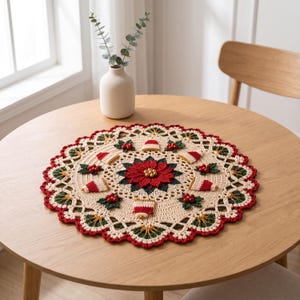 May include: A round, cream-colored crochet doily featuring a central red poinsettia flower with gold beads, surrounded by a repeating pattern of small red and white bells, green holly leaves, and red berries, finished with a scalloped red border.