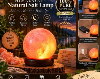 May include: A spherical Himalayan natural salt lamp with a warm orange glow, mounted on a dark circular wooden base. The lamp is USB powered and shown connected to a laptop, power bank, and wall adapter. Text on the image includes Himalayan Natural Salt Lamp, 100% Pure Natural Salt, and Pure Natural Better Living.