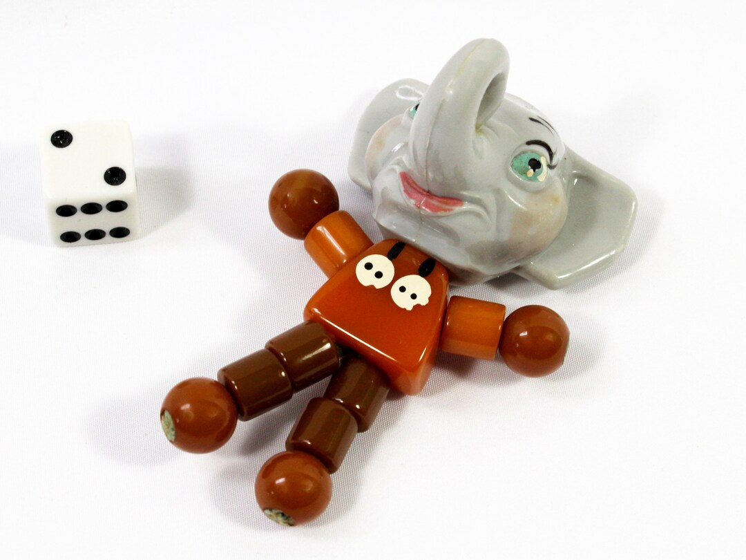 Bakelite Rattles 1930s Tykie Toys Bakelite Elephant Rattle, Elephant With Butterscotch ...