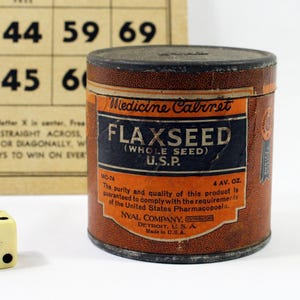 Vintage Nyal Medicine Cabinet Flaxseed Carton with Metal Lid, Orange and Black Whole Seed Flax Tin