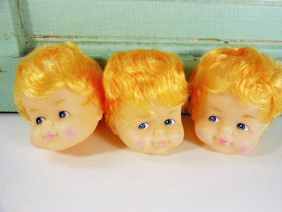 baby doll with red hair and blue eyes