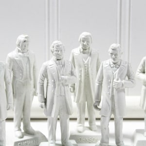 Six Vintage Unpainted Marx Toy President Figurines; White Plastic Fillmore, Pierce, Buchanan, Lincoln, Johnson, & Grant Dolls