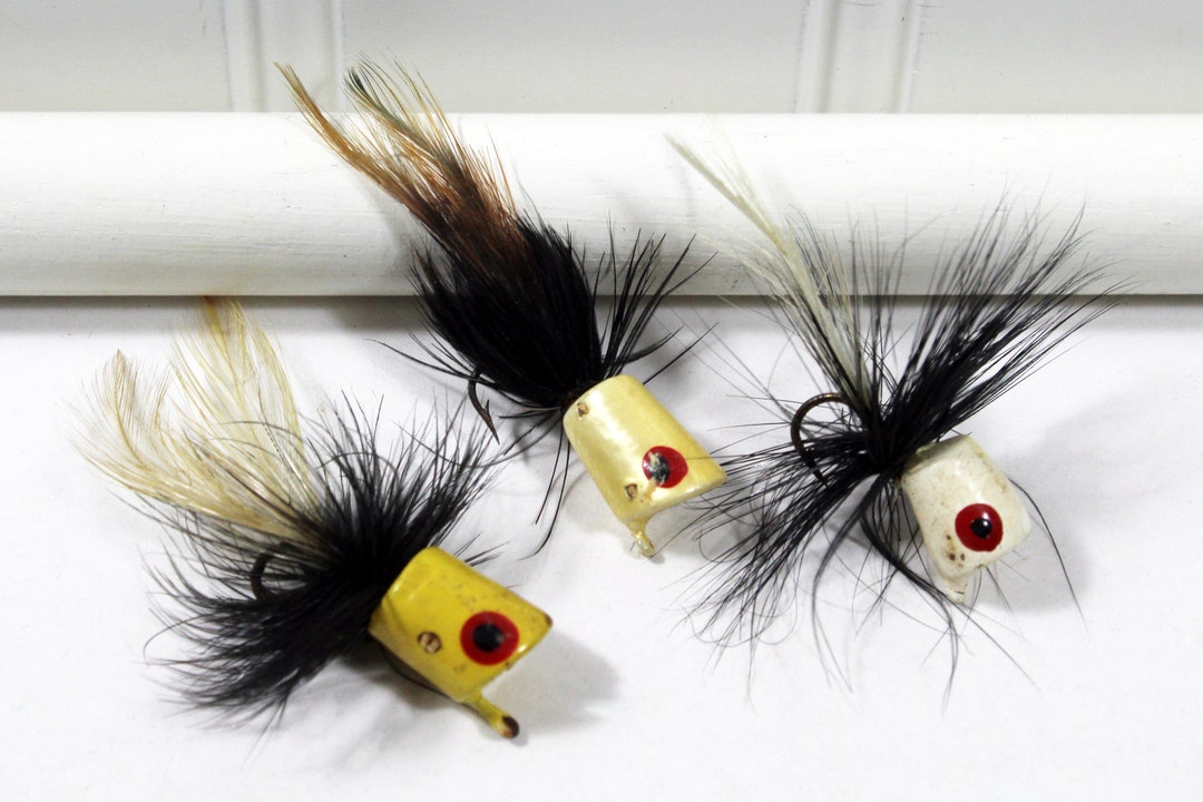 Three Vintage Feather Poppers Fishing Lures Yellow, Black, and White -   Canada