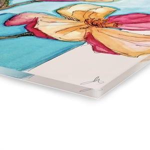 May include: A rectangular acrylic wall art piece featuring a watercolor illustration of flowers with vibrant pink and orange petals against a bright turquoise background. The artwork includes a thin black ink outline and a signature in the bottom corner.