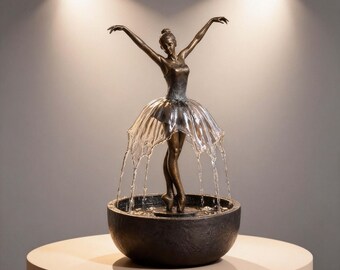 Fuente con figura de bailarina de ballet elegante: diseño compacto de sobremesa con suave chorro de agua, ideal para espacios de meditación.