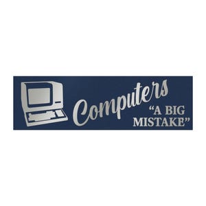 May include: A rectangular dark blue sticker featuring a silver-toned illustration of a vintage desktop computer on the left side. To the right, the text reads "Computers A BIG MISTAKE" in a silver-toned, stylized script and block font.