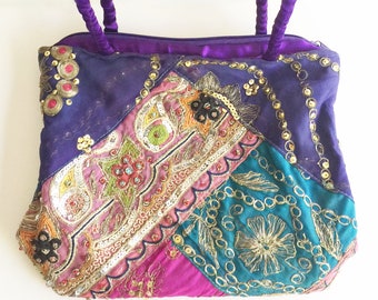 Porte-monnaie orné multicolore avec doublure en soie violette