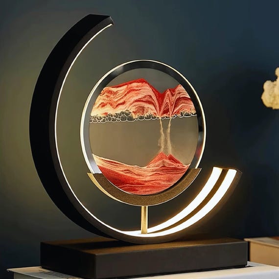Sand art meets mood lighting — the built-in LED transforms a flowing sandscape into an ambient night lamp, making it genuinely more interesting than a plain frame.